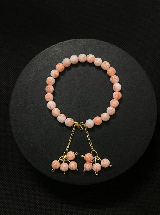 Peach color bead bracelet